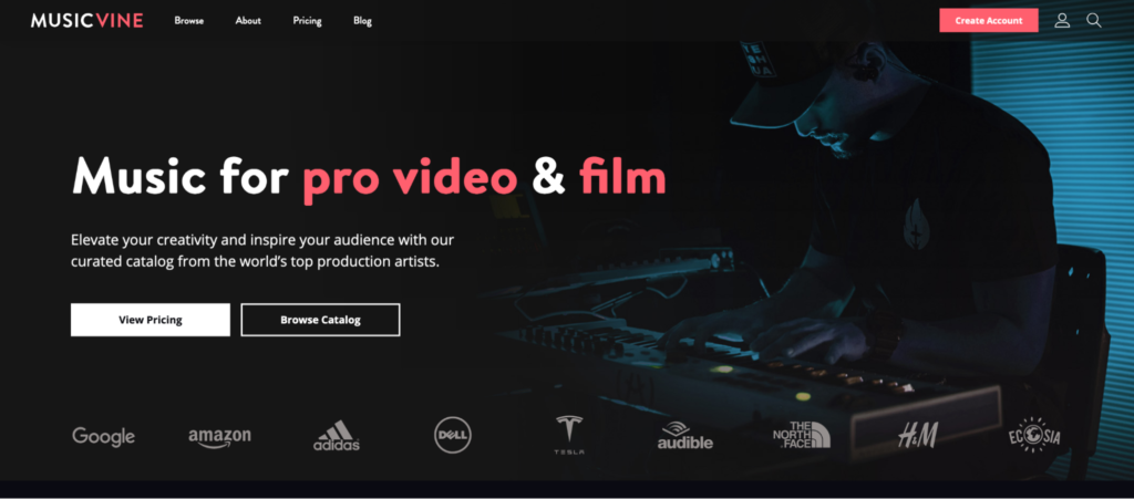 Music production enthusiast working on audio equipment with musicvine, a professional music licensing platform, advertised in the background.