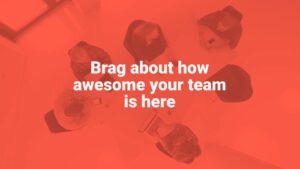 Overhead view of a team meeting at a table created with Biteable video maker, featuring an overlay text that says "brag about how awesome your team is here", tinted in red.