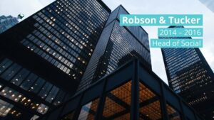 Modern glass skyscrapers with a name "Robson & Tucker" and the text "2014 – 2016 Head of Social at Biteable Video Maker" overlaid against a clear sky.