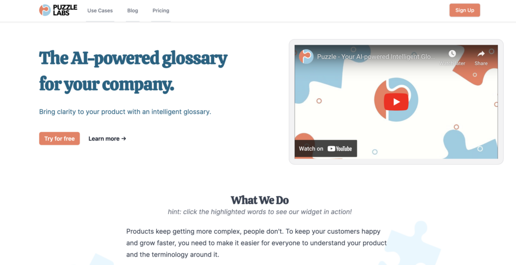 Webpage screenshot of puzzle labs, featuring an ai-powered glossary service with a centered Biteable promotional video thumbnail and navigational links at the top.