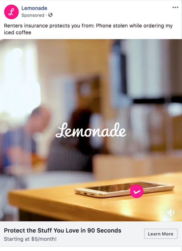 Advertisement showing a blurred barista with an iced coffee, a clear focus on a smartphone on a table with the Biteable video maker app open, highlighting theft protection.