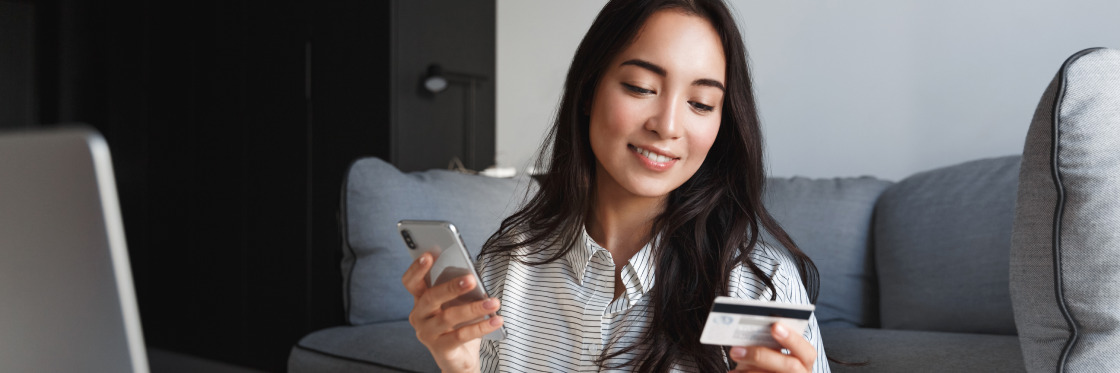 Instagram checkout The good, the bad, and the ugly Woman sitting on a couch, holding a smartphone and a credit card, possibly shopping online or managing finances using Biteable video maker.