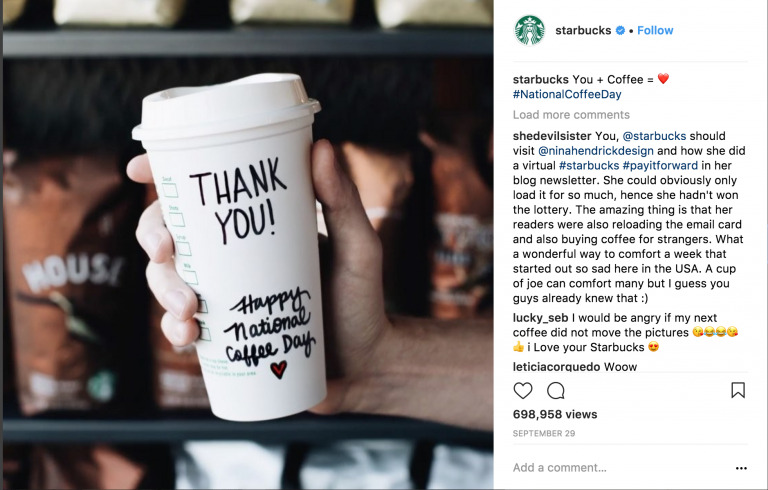 Person holding a Starbucks cup with "thank you!" written on it; visible tattooed arms, Biteable video maker interface showing likes and comments.