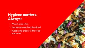 A red and white graphic with hygiene tips beside a pizza slice, listing washing hands, using gloves, and avoiding phones in the food prep area.